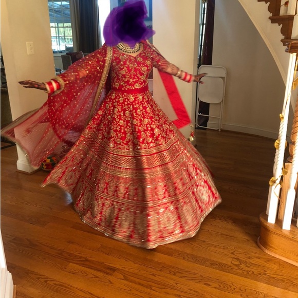 India Boutique Dresses & Skirts - Sabyasachi copy lehnga in crimson red color.